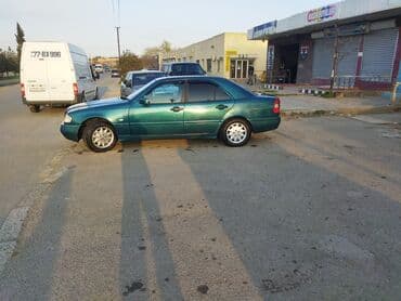 бампер на мерседес w210: Mercedes-Benz markalı, tünd firuzəyi rəngli sedan. Avtomobil rahat və — 7