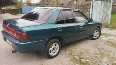 lider disk təkər: Mazda 323: 1.6 l | 1994 il Sedan — 6