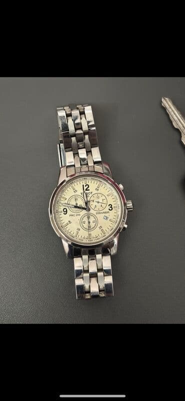 pandora qutusu: İşlənmiş, Qol saatı, Tissot — 1