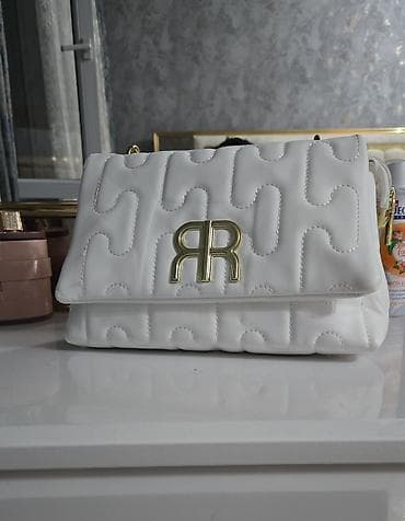 Qol saatları və aksesuarlar: Çox keyfiyyetli ag çanta.1 eded qalib.Ölçüsü 27×18 — 2