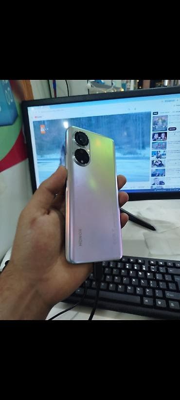 Foto və videokameralar: Honor 7X, 128 GB, rəng - Gümüşü, Sensor, Barmaq izi, Simsiz şarj — 1