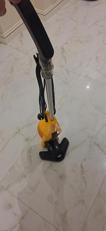 Yüngül ştanqlı elektrikli tozsoran - Kompakt vertikal dizayn: dar