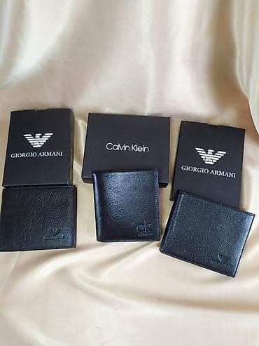 sumqa: 💯 temiz A luks dəri pul qabı. İcinde kart ve qepik yeride var. Her — 2