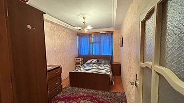 Kirayə üçün mənzil – çoxmərtəbəli binada 3 otagli menzil. - Pəncərədən — 4