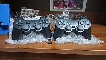 xbox 360 pultu: İkili simsiz oyun pultu dəsti - Paketdə: 2 ədəd qara gamepad və 1 — 1