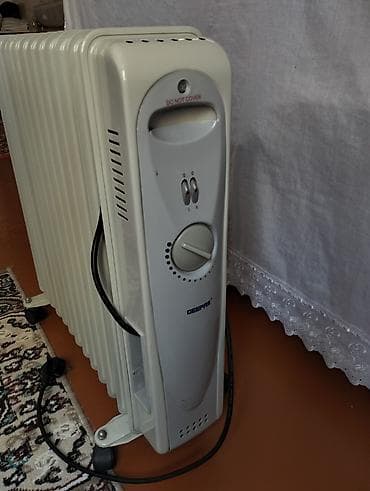 Elektrikli radiator satılır.Qiyməti 70 azn — 3