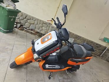 led panel: UPMT X-MAX skuter – parlaq narıncı-qara dizayn, şəhər üçün çevik və — 3