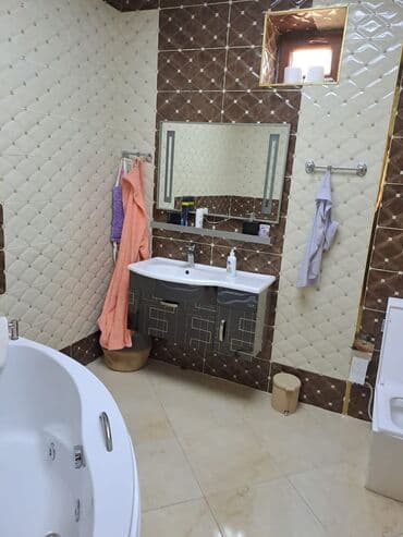 razin stansiyasi: Ev iki mərtəbəlidir və geniş həyəti var. Həyətdə açıq havada oturmaq — 2