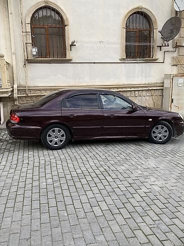 opel vectra c: Hyundai Sonata: 2.4 l | 2003 il Sedan — 9