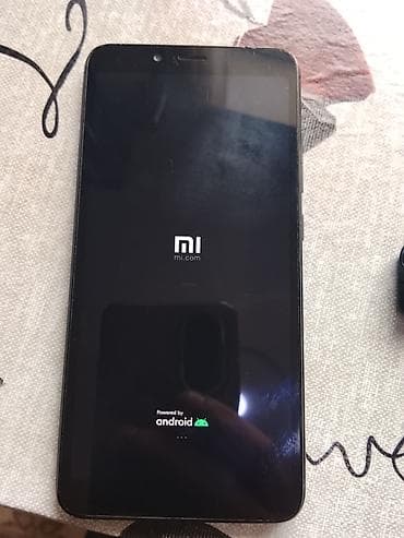 samsung core 2 qiymeti: Xiaomi Redmi 6A (M1804C3CG) - Ekran: 5.45" HD+ (18:9), toxunuş — 3