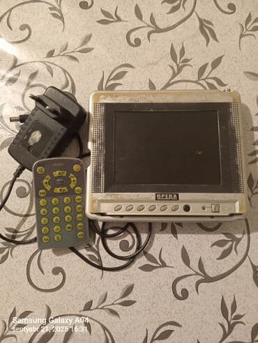 OPERA portativ ekranlı multimedia qurğusu Xüsusiyyətlər: -