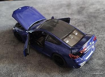 dvd diskler: BMW M8 Gran Coupé 1:32. model avtomobil maketi - Miqyas: təxmini — 8