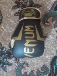 boks elcekleri qiymeti: Boks əlcəyi Təzədir 12 razmer 35 AZN Məhsul təsviri: - Brend: Venum — 5