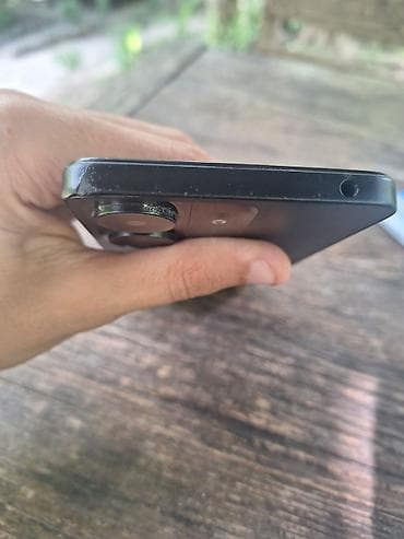 Redmi 13C 128/6 Ekrandq cat var qiraqlarinda ezik var adapter qosma — 5