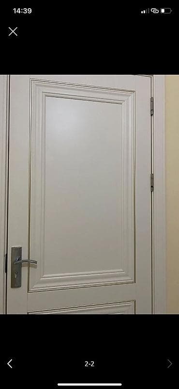 Dekorativ divar panelləri: Ağ rəngdə daxili otaq qapısı - Klassik dizayn: iki panelli (yuxarıda — 1