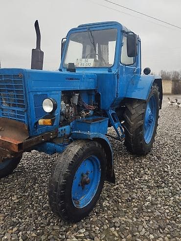 m guzgu: Mavi rəngli MTZ 80 Xüsusiyyətlər: - Kabinalı, yan güzgülərlə - Dizel — 1