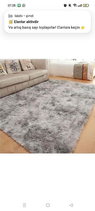 Yumşaq tüklü xalça – boz rəngli, uzun tüklü, püş/puf effektli səth. - — 1