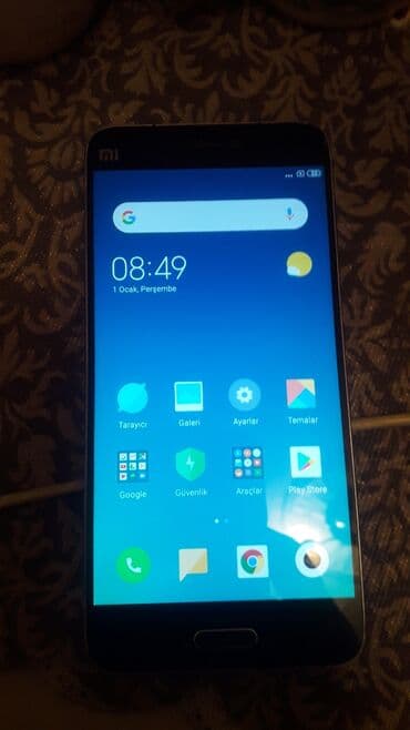 Apple iPhone: Xiaomi Mi 5, 
 Barmaq izi — 2