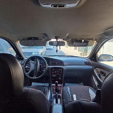 sud ceni: Kia Clarus: 2 l | 1997 il Sedan — 9