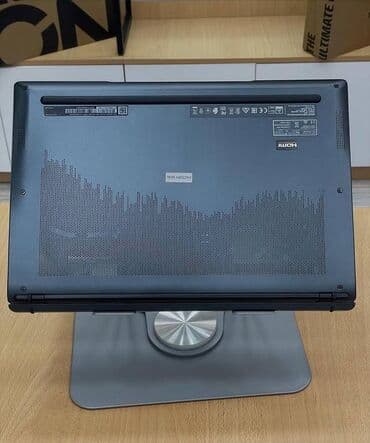 a 11: MSI ultrabook – zərif və yüngül metal gövdə, tünd boz rəng. 14″ nazik — 5