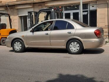 kia sportage 2006: Nissan Sunny: 1.3 l | 2006 il Sedan — 3