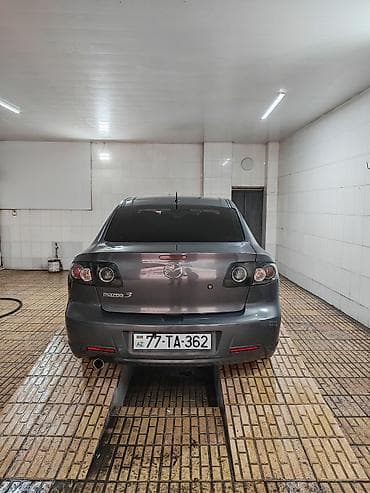 qapi zili: Mazda 3 sedan - Kuzov: sedan, tünd-boz rəng - Mühərrik: benzin (detal — 10