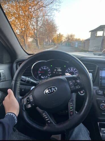 Kia Optima sükanı (2011–2014) - Orijinal Kia emblemi və hava yastığı