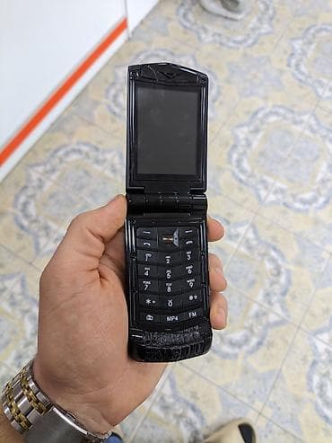 qədimi telefonlar: Lüks düyməli qapaqlı telefon - Korpus: qara rəng, metal üslublu — 3
