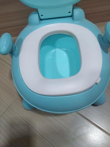 горшок новый: Uşaq üçün raket dizaynlı oturacaqlı gorşok. Açıq mavi rəngdədir və — 2
