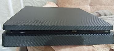 plesteysin: PS4 slim 1 TB versiya 12.50 içində 14 oyun var 2 jostik orginaldi — 1