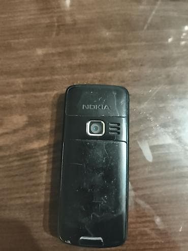 Nokia 130, 2 ГБ, цвет - Черный, Кнопочный — 2