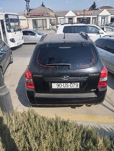 kia rio start stop: Hyundai Tucson: 2 l | 2008 il Krossover — 2