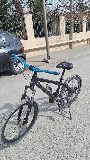 Velosipedlər: Dağ velosipedi – sərt çərçivə, amortizatorlu ön çəngəl və disk əyləclə — 1