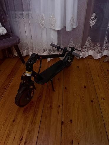 Velosiped ehtiyyat hissələri: (alaqə nömrəsi 0553920782)Elektrik skuter – qara rəng, kompakt və — 7