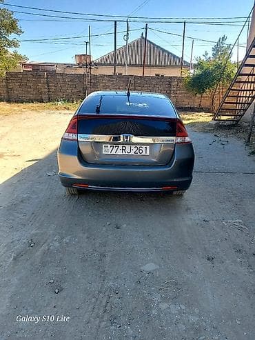 yarasa spoyler: Honda Insight: 1.3 l | 2014 il Hetçbek — 6