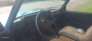 qazel turbo az: Model: Lada (VAZ) 2107, sedandır. Rəng: açıq mavi. Kuzov: 4 qapı — 4