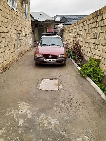 niva baqaj: Opel Astra F Caravan (universal) – qırmızı rəng - Kuzov: universal — 2