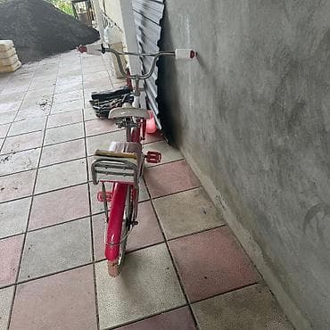 suru: Uşaq velosipedi – 20" təkərli, şəhər/oyun üslubunda. Xüsusiyyətlər: - — 2
