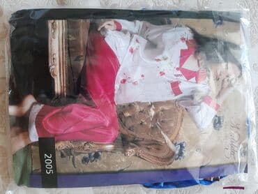 kiqurum qadın pijamaları: Bu, rahat və dəbli qadın pijamasıdır. Ağ rəngdə olan bu pijama, tünd — 2