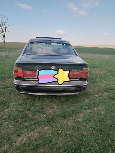 BMW 520: 2 l | 1988 il Sedan