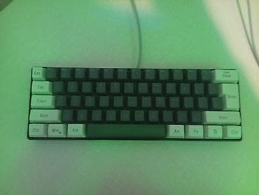 komputer korpusu: • Kompakt mexaniki klaviatura – təxminən 60% layout • İki rəngli — 1