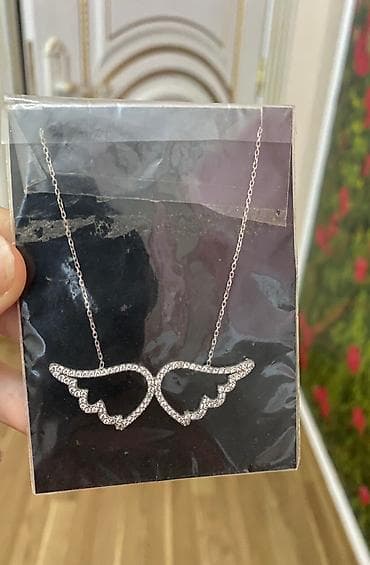 Boyunbağı, Gümüş, Ünvandan götürmə