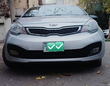 lalafo.az masinlar kredit: Kia Rio – gümüşü rəng, sedan gövdə. Xarici: - Aerodinamik ön bamper — 3
