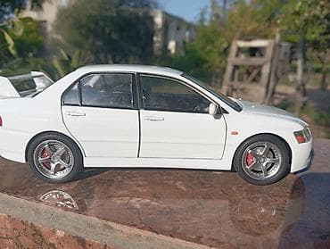 Mitsubishi Lancer Evolution 1/24 ölcüdədir model Təzədir Sadəcə