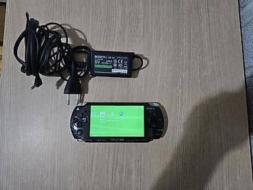 philips xenium 9@9d: PSP 2000 modeli original adapteri ile birlikde. Qiymetde razilasma — 1