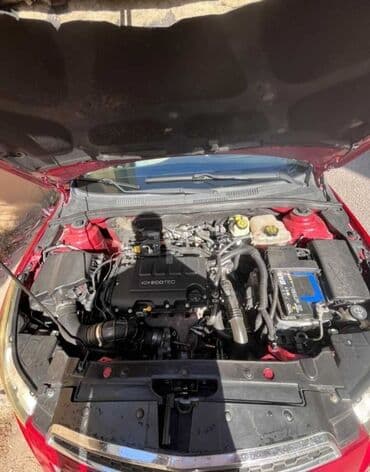 turbo az qız maşınları: Chevrolet Cruze sedan – RS paketli, qırmızı rəng. - Kuzov: 4 qapılı — 11
