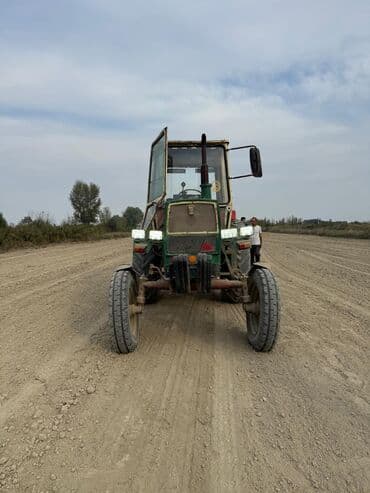traktor teker satisi: Belarus MTZ traktoru - Kabinəli, ön təkərli konstruksiya - Dizel — 4