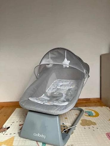 Oğlan və qız üçün, Beşik, Yellənmə mexanizm ilə