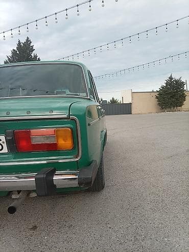 vaz 2106 stoplari: VAZ 2106, yaşıl rəng, sedan kuzov. Xüsusiyyətlər:mator 03. Karobka 5 — 6