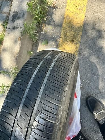 l200 disk: Michelin markalı avtomobil şini. Ölçüsü: **185/70 R14** Yük/sürət — 2